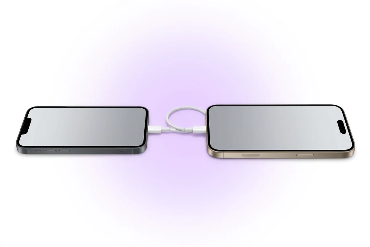 Перенесення даних iPhone 16 Pro Max: два iPhone з'єднані кабелем USB-C, екрани з нейтральною заливкою