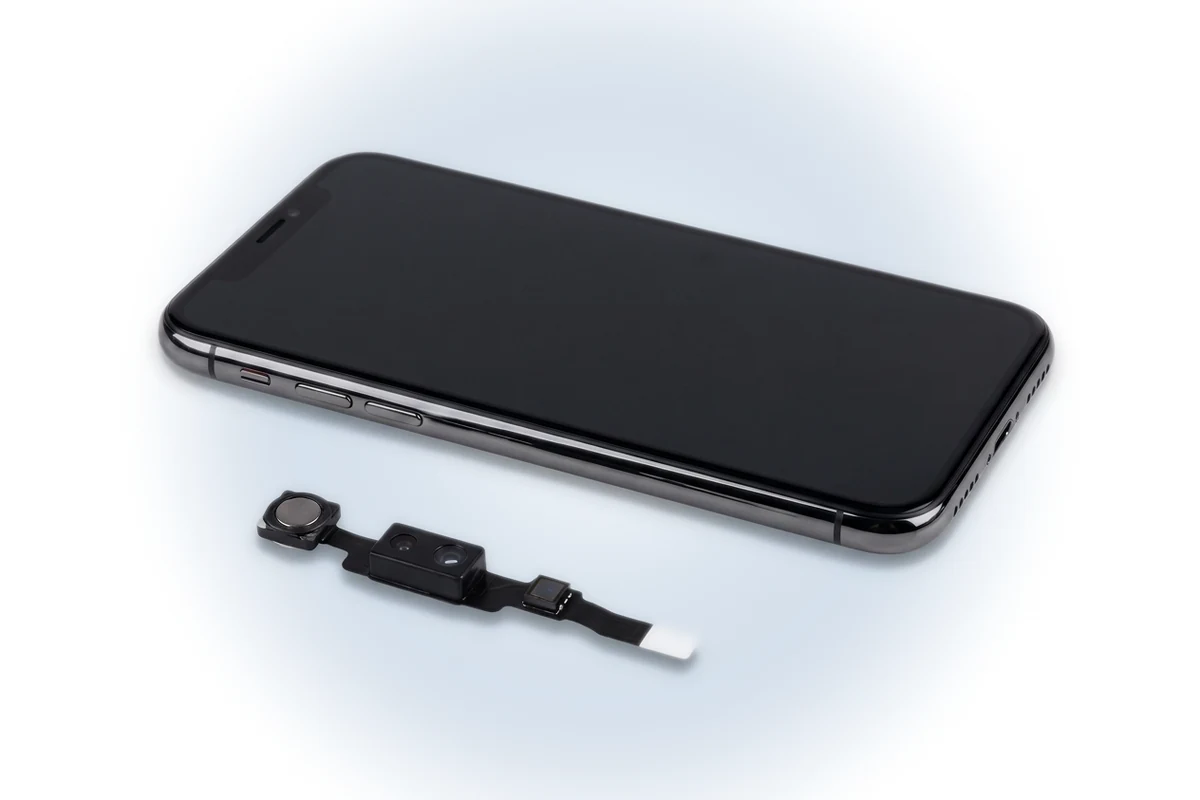 Снятый блок слухового динамика iPhone X с датчиком приближения, прожектором и датчиком освещенности на одном шлейфе